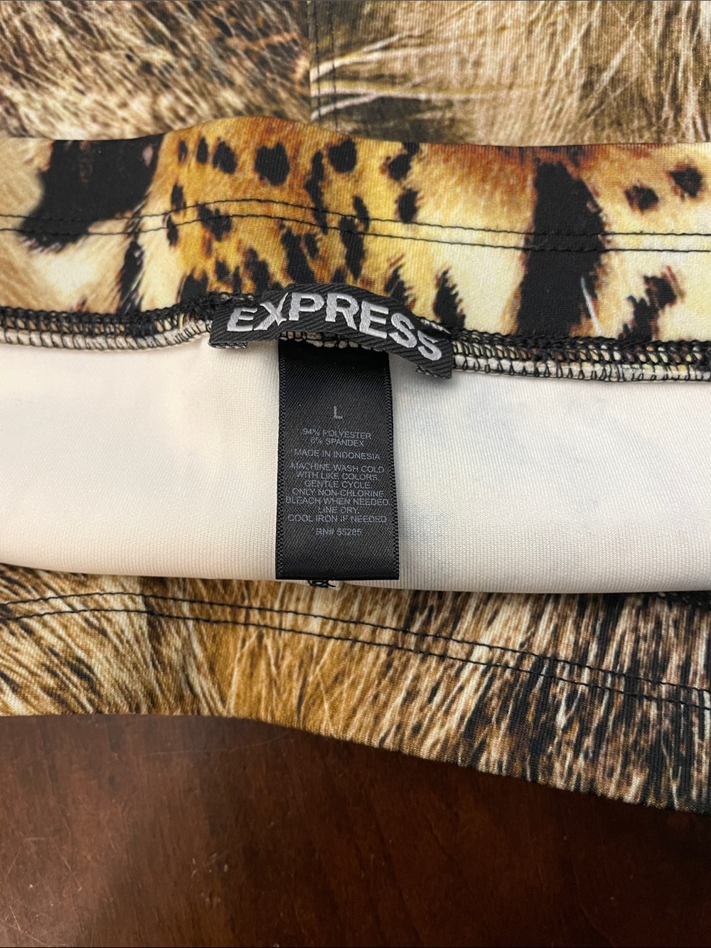 Express Leopard Face Print Leggings in Yellow, Brown, Black - Picture 16 of 16